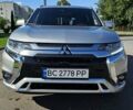 Серый Мицубиси Аутлендер, объемом двигателя 2.36 л и пробегом 73 тыс. км за 28500 $, фото 1 на Automoto.ua