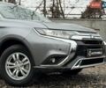 Серый Мицубиси Аутлендер, объемом двигателя 2 л и пробегом 122 тыс. км за 20990 $, фото 1 на Automoto.ua