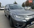 Серый Мицубиси Аутлендер, объемом двигателя 2 л и пробегом 121 тыс. км за 21700 $, фото 1 на Automoto.ua