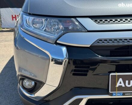 Серый Мицубиси Аутлендер, объемом двигателя 2 л и пробегом 58 тыс. км за 21790 $, фото 7 на Automoto.ua