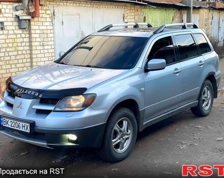 Сірий Міцубісі Аутлендер, об'ємом двигуна 2 л та пробігом 333 тис. км за 4850 $, фото 1 на Automoto.ua
