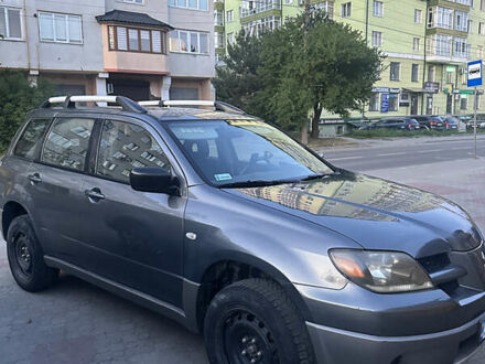 Міцубісі Аутлендер 2003 у Івано-Франківську на Automoto.ua Сірий Міцубісі Аутлендер, об'ємом двигуна 2 л та пробігом 294 тис. км за 5000 $, фото 1 на Automoto.ua