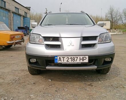 Серый Мицубиси Аутлендер, объемом двигателя 2 л и пробегом 310 тыс. км за 6500 $, фото 1 на Automoto.ua