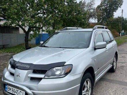 Сірий Міцубісі Аутлендер, об'ємом двигуна 2 л та пробігом 252 тис. км за 4600 $, фото 1 на Automoto.ua