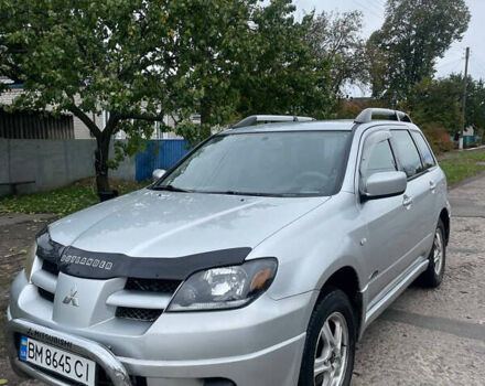 Сірий Міцубісі Аутлендер, об'ємом двигуна 2 л та пробігом 252 тис. км за 4600 $, фото 1 на Automoto.ua
