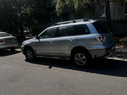 Сірий Міцубісі Аутлендер, об'ємом двигуна 2.4 л та пробігом 285 тис. км за 4400 $, фото 1 на Automoto.ua