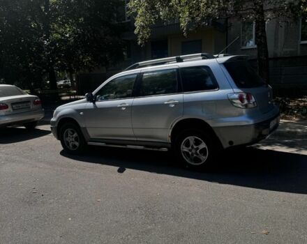 Сірий Міцубісі Аутлендер, об'ємом двигуна 2.4 л та пробігом 285 тис. км за 4400 $, фото 1 на Automoto.ua