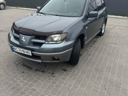 Сірий Міцубісі Аутлендер, об'ємом двигуна 2 л та пробігом 211 тис. км за 4900 $, фото 1 на Automoto.ua