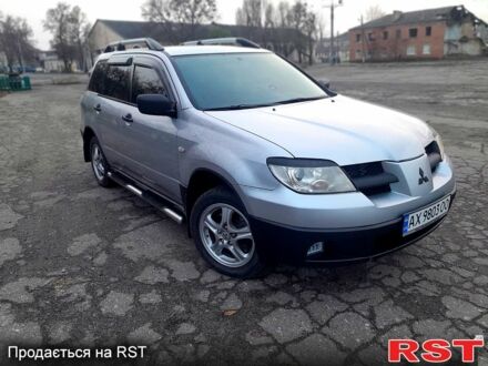 Серый Мицубиси Аутлендер, объемом двигателя 2 л и пробегом 0 тыс. км за 5000 $, фото 1 на Automoto.ua