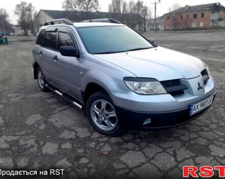 Серый Мицубиси Аутлендер, объемом двигателя 2 л и пробегом 0 тыс. км за 5000 $, фото 1 на Automoto.ua