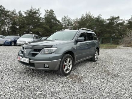 Серый Мицубиси Аутлендер, объемом двигателя 0 л и пробегом 265 тыс. км за 6300 $, фото 1 на Automoto.ua