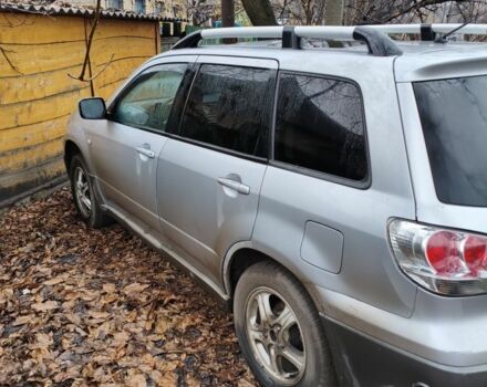 Серый Мицубиси Аутлендер, объемом двигателя 2 л и пробегом 371 тыс. км за 5700 $, фото 1 на Automoto.ua