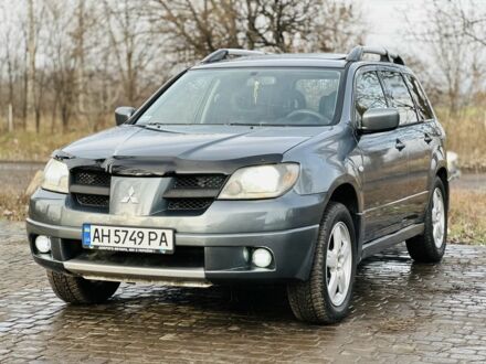 Сірий Міцубісі Аутлендер, об'ємом двигуна 2 л та пробігом 280 тис. км за 3500 $, фото 1 на Automoto.ua