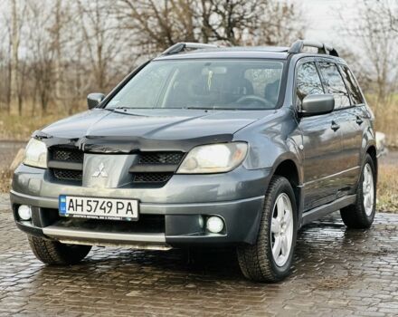 Серый Мицубиси Аутлендер, объемом двигателя 2 л и пробегом 280 тыс. км за 3500 $, фото 1 на Automoto.ua