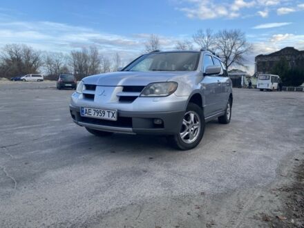 Сірий Міцубісі Аутлендер, об'ємом двигуна 2 л та пробігом 228 тис. км за 6300 $, фото 1 на Automoto.ua