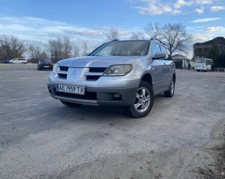 Серый Мицубиси Аутлендер, объемом двигателя 2 л и пробегом 228 тыс. км за 6300 $, фото 1 на Automoto.ua