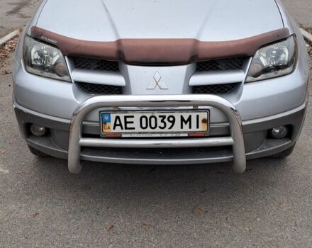 Серый Мицубиси Аутлендер, объемом двигателя 2 л и пробегом 240 тыс. км за 3900 $, фото 1 на Automoto.ua