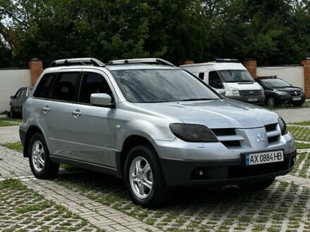Мицубиси Аутлендер 2003 в Харькове на Automoto.ua Серый Мицубиси Аутлендер, объемом двигателя 2 л и пробегом 317 тыс. км за 5300 $, фото 1 на Automoto.ua
