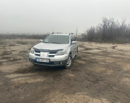 Сірий Міцубісі Аутлендер, об'ємом двигуна 2.4 л та пробігом 275 тис. км за 6400 $, фото 1 на Automoto.ua