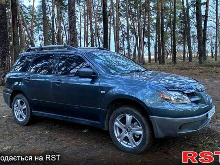 Мицубиси Аутлендер 2003 в Ахтырке на Automoto.ua Серый Мицубиси Аутлендер, объемом двигателя 2 л и пробегом 245 тыс. км за 5450 $, фото 1 на Automoto.ua