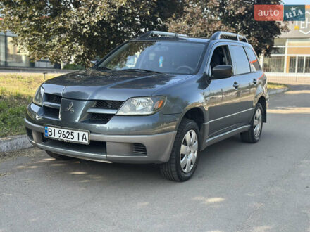 Мицубиси Аутлендер 2003 в Кременчуге на Automoto.ua Серый Мицубиси Аутлендер, объемом двигателя 2 л и пробегом 363 тыс. км за 5450 $, фото 1 на Automoto.ua