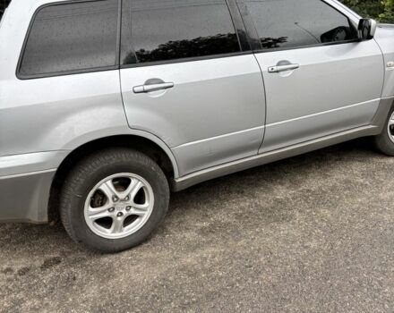 Серый Мицубиси Аутлендер, объемом двигателя 2 л и пробегом 2 тыс. км за 4261 $, фото 1 на Automoto.ua