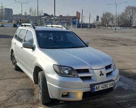 Сірий Міцубісі Аутлендер, об'ємом двигуна 2 л та пробігом 320 тис. км за 7300 $, фото 1 на Automoto.ua