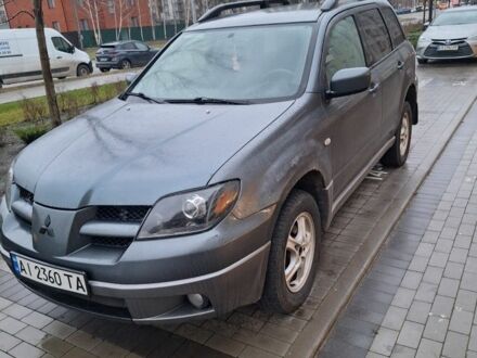 Сірий Міцубісі Аутлендер, об'ємом двигуна 2.4 л та пробігом 286 тис. км за 4800 $, фото 1 на Automoto.ua