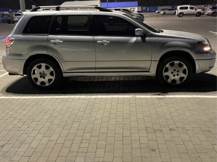 Мицубиси Аутлендер 2004 в Николаеве на Automoto.ua Серый Мицубиси Аутлендер, объемом двигателя 2.4 л и пробегом 285 тыс. км за 4950 $, фото 1 на Automoto.ua