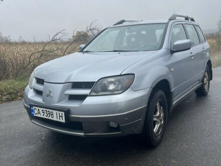 Серый Мицубиси Аутлендер, объемом двигателя 2.38 л и пробегом 432 тыс. км за 4700 $, фото 1 на Automoto.ua