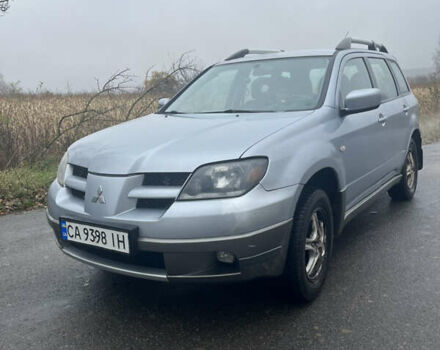Серый Мицубиси Аутлендер, объемом двигателя 2.38 л и пробегом 432 тыс. км за 4700 $, фото 1 на Automoto.ua