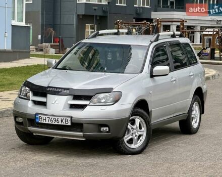 Сірий Міцубісі Аутлендер, об'ємом двигуна 2.4 л та пробігом 253 тис. км за 5600 $, фото 1 на Automoto.ua