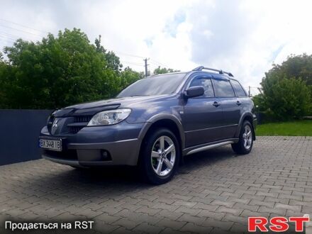 Мицубиси Аутлендер 2004 в Хмельницком на Automoto.ua Серый Мицубиси Аутлендер, объемом двигателя 2.4 л и пробегом 215 тыс. км за 6700 $, фото 1 на Automoto.ua