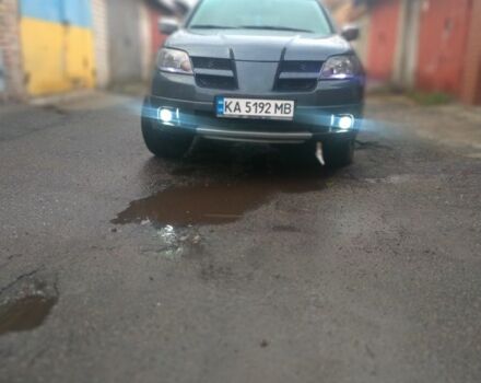 Серый Мицубиси Аутлендер, объемом двигателя 2.4 л и пробегом 286 тыс. км за 7400 $, фото 1 на Automoto.ua