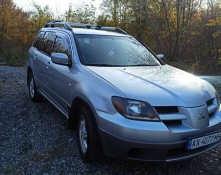 Серый Мицубиси Аутлендер, объемом двигателя 2.4 л и пробегом 317 тыс. км за 5200 $, фото 1 на Automoto.ua