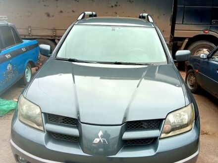Сірий Міцубісі Аутлендер, об'ємом двигуна 2.4 л та пробігом 204 тис. км за 5600 $, фото 1 на Automoto.ua