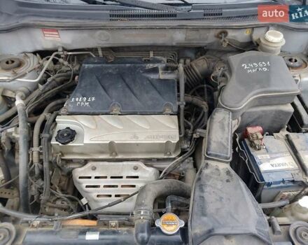 Сірий Міцубісі Аутлендер, об'ємом двигуна 2.38 л та пробігом 255 тис. км за 6000 $, фото 1 на Automoto.ua