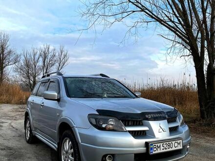 Мицубиси Аутлендер 2004 в Ромнах на Automoto.ua Серый Мицубиси Аутлендер, объемом двигателя 2.4 л и пробегом 279 тыс. км за 6300 $, фото 1 на Automoto.ua