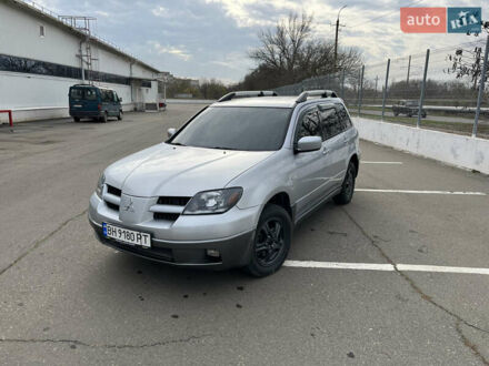 Сірий Міцубісі Аутлендер, об'ємом двигуна 2.38 л та пробігом 252 тис. км за 5400 $, фото 1 на Automoto.ua