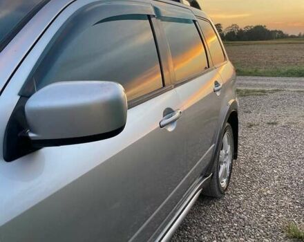 Серый Мицубиси Аутлендер, объемом двигателя 2 л и пробегом 374 тыс. км за 5900 $, фото 1 на Automoto.ua