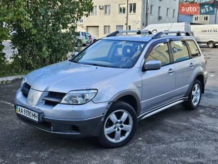 Серый Мицубиси Аутлендер, объемом двигателя 2.4 л и пробегом 202 тыс. км за 4000 $, фото 1 на Automoto.ua