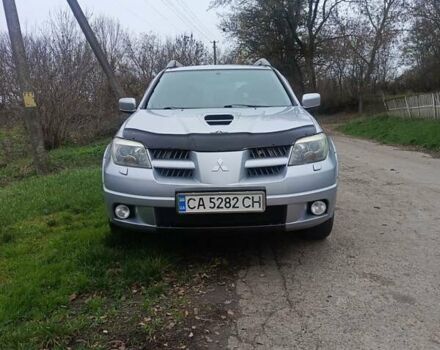 Сірий Міцубісі Аутлендер, об'ємом двигуна 2 л та пробігом 230 тис. км за 5200 $, фото 1 на Automoto.ua