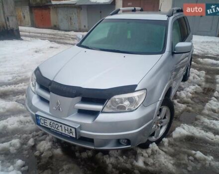 Сірий Міцубісі Аутлендер, об'ємом двигуна 2 л та пробігом 260 тис. км за 5300 $, фото 1 на Automoto.ua