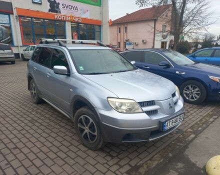 Сірий Міцубісі Аутлендер, об'ємом двигуна 2.4 л та пробігом 246 тис. км за 5500 $, фото 1 на Automoto.ua