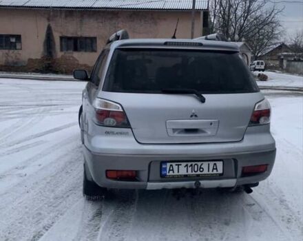 Сірий Міцубісі Аутлендер, об'ємом двигуна 2 л та пробігом 250 тис. км за 5500 $, фото 1 на Automoto.ua
