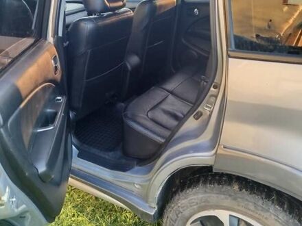 Сірий Міцубісі Аутлендер, об'ємом двигуна 2.38 л та пробігом 295 тис. км за 5500 $, фото 1 на Automoto.ua