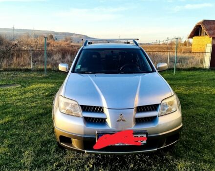Серый Мицубиси Аутлендер, объемом двигателя 0 л и пробегом 245 тыс. км за 5300 $, фото 1 на Automoto.ua