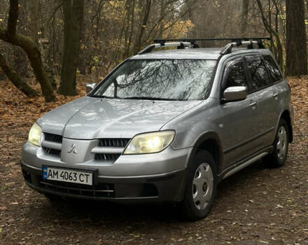 Сірий Міцубісі Аутлендер, об'ємом двигуна 2.38 л та пробігом 303 тис. км за 5200 $, фото 1 на Automoto.ua