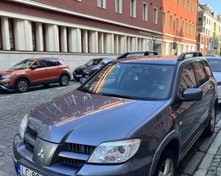 Сірий Міцубісі Аутлендер, об'ємом двигуна 2.4 л та пробігом 264 тис. км за 3700 $, фото 1 на Automoto.ua