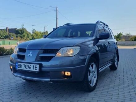 Мицубиси Аутлендер 2005 в Житомире на Automoto.ua Серый Мицубиси Аутлендер, объемом двигателя 2.38 л и пробегом 259 тыс. км за 6200 $, фото 1 на Automoto.ua